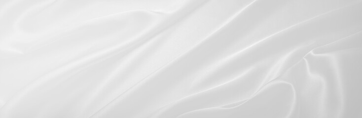 白いサテンの布の背景テクスチャー