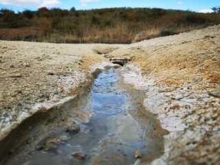 Small fresh river in the middle of the draught