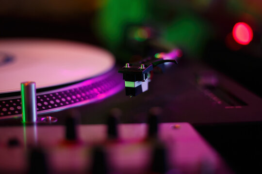 Turntables needle cartridge on tone arm. Professional dj turn table setup for scratch. Vinyl player for hip hop disc jockey