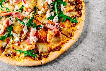 Pizza with Mozzarella cheese, meat, beef, ham, mushroom, shrimp, spices. Italian pizza