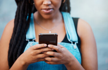 Black woman hands with smartphone for social media, website contact information or reading online...
