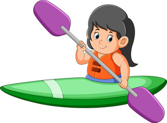 The happy girl is rowing the canoe with the long paddle
