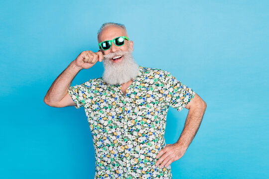 Portrait photo of old age senior man wear summer shirt toothy smile nice sun glasses ray ban funny mustache successful boss isolated on blue color background
