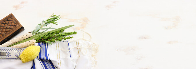 Jewish festival of Sukkot. Traditional symbols (The four species): Etrog (citron), lulav (palm branch), hadas (myrtle), arava (willow)