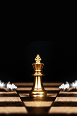 Vertical king chess stand pieces with falling chess concept of team player or business team and leadership strategy or strategic planning and human resources organization risk management.