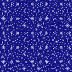 Snowflakes seamless pattern of many snowflakes on the dark blue background. Winter design. Christmas decoration.
