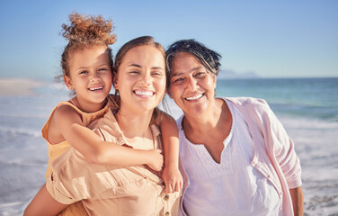 Girl, mother and grandmother portrait on the beach during travel holiday in Spain in summer together. Child, mom and senior person in retirement with happy smile on vacation with family by the sea