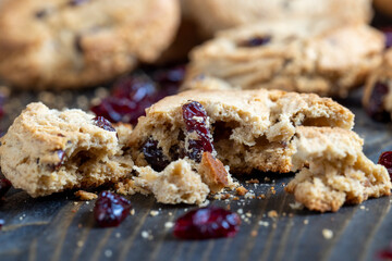 delicious dried cookies made of high-quality flour with dried red cranberries on the table
