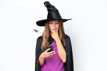 Young caucasian woman costume as witch isolated on white background thinking and sending a message