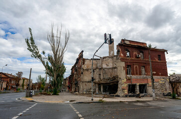 destroyed and burned houses in the city during the war in Ukraine