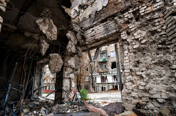 destroyed and burned houses in the city during the war in Ukraine