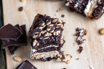 chocolate cake with nut filling and peanuts