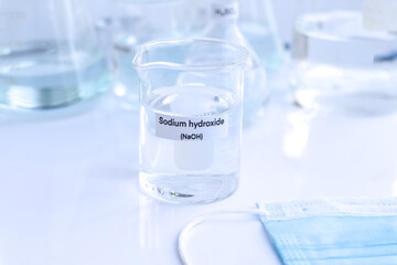 sodium hydroxide in glass, chemical in the laboratory and industry