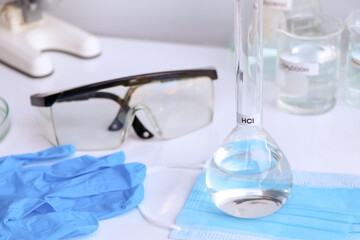 Fototapeta na wymiar hydrochloric acid in glass, chemical in the laboratory and industry