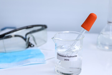 potassium hydroxide in glass, chemical in the laboratory and industry