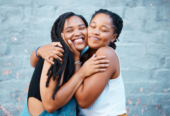 Happy, hug and black friends in the city while on summer vacation together in south africa. Happiness, smile and african women embracing, bonding with affection on the urban street on holiday.