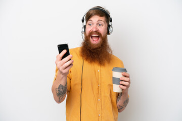 Telemarketer man isolated on white background holding coffee to take away and a mobile