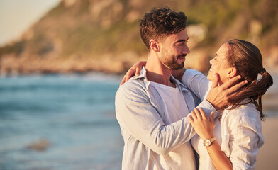 Love, beach and couple embrace at sunset for romantic summer evening date together in nature. Happy, sweet and satisfied people in relationship make eye contact for affection and care.