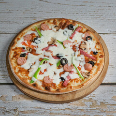 pizza with salami and mushrooms