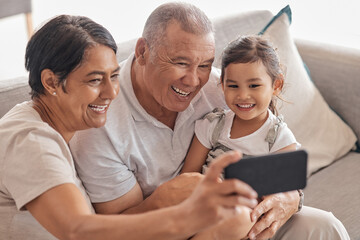 Family, grandparents and selfie on smartphone with child happy and excited to bond with relatives. Phone photograph for senior grandmother and grandpa babysitting grandchild in Mexico home. - obrazy, fototapety, plakaty