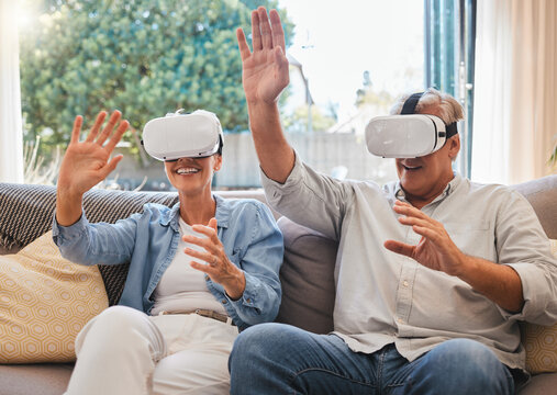 Couple, VR and retirement on sofa, gaming, web and laugh in home living room. Elderly man, woman and glasses for virtual reality do esports for fun in house with tech, smile and futuristic 3D games