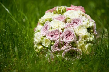 Bright wedding bouquet for the ceremony from fresh flowers