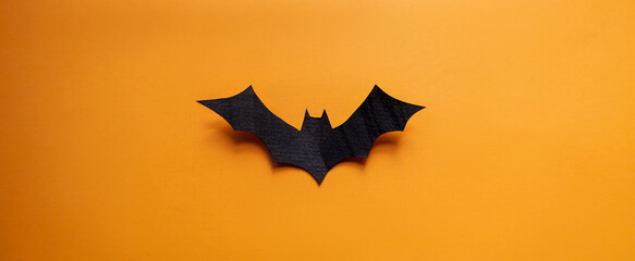 A banner layout for the Halloween holiday. Applications, carving figure in the shape of black bat....