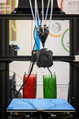 3D printer in operation. Filament-type 3D printer, ready to use.