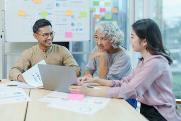 Asian entrepreneurs and business people meeting in a conference room in business planning, financial budget and investment risk assessment to analyze customer groups to increase company growth