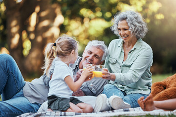 Juice, vitamin c and family picnic with child and grandparents for healthy growth development,...
