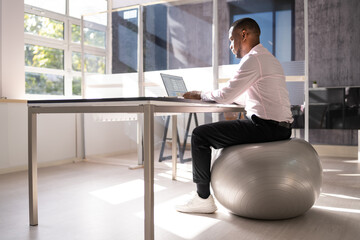 Correct Posture At Desk In Office