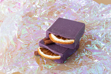 Natural handmade soap bars with oranges and cinnamon sticks. Christmas gift set. Space for text