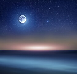  starry sky  blue moon nebula reflection on on sea water  beautiful seascape milky way universe template background copy space