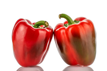 Two juicy ripe, sweet peppers, close-up, isolated on white.