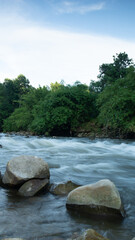 photo of a stream in the afternoon in Aceh Indonesia