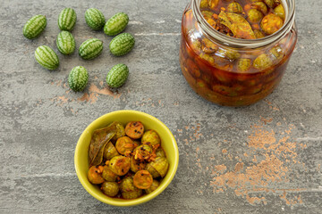 South Indian style pickled cucamelon vegetable. Homemade preserved food.