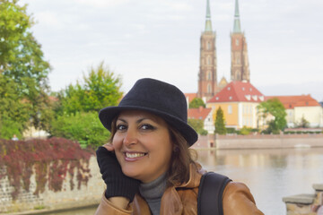 portrait of a happy woman in wroclaw city, poland