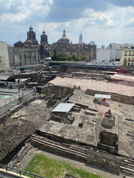 Tenochtitlan Ruins at Templo Mayor with Mexico City Metropolitan Cathedral in Background