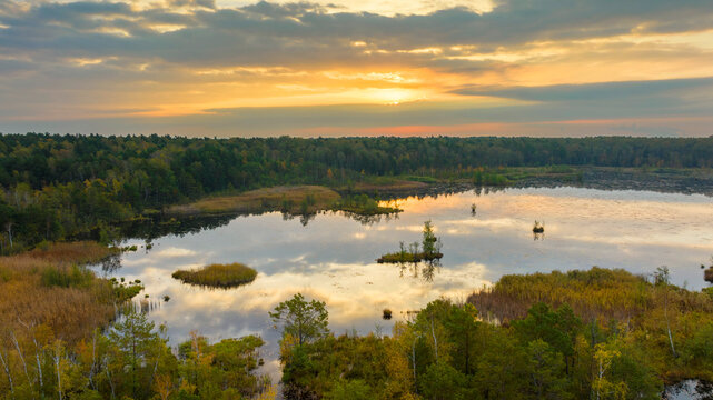 Beautiful autumn sunrise over the lake - Swiete Lugi, Poland