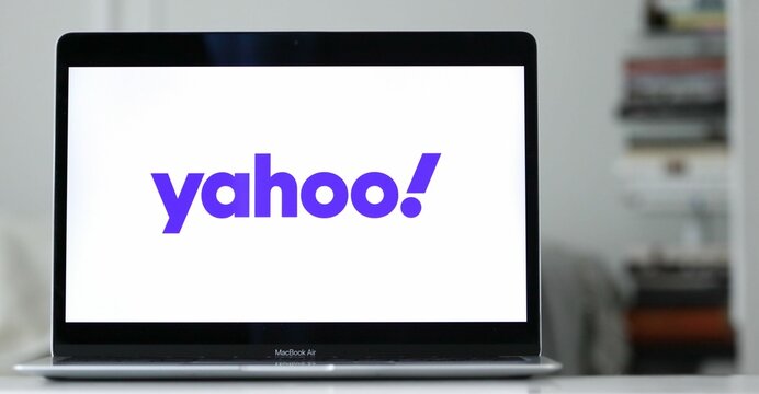 Logo Of Yahoo, An American Web Services Provider And Search Engine, Is Shown On A Laptop Display