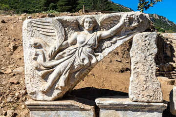 Sculpture relief from the door of Heracles of Winged,  Nike the Goddess of victory at Ephesus, Selcuk, Izmir, Turkey.