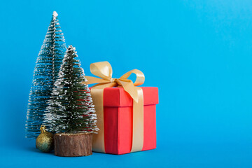 Christmas composition. craft Gift box, small tree, branches and craft DIY decorations on white background. New year concept. Christmas home decoration Flat lay, top view, copy space