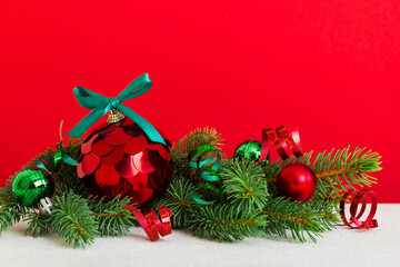 New Year Christmas tree toy, branches of a christmas tree, New Year decorations on a colored background