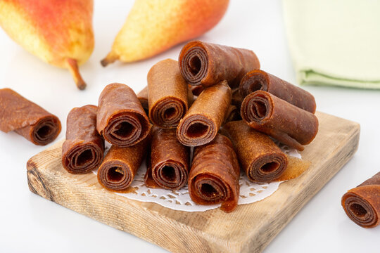 Handmade pastille made of apple pulp. Natural sweet dessert for tea. Raw homemade fruit leather.