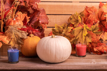 Naklejka na ściany i meble Autumn still life white pumpkin on wooden background