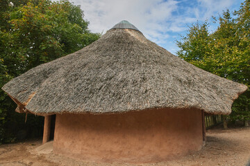 Fototapeta na wymiar Decorative African hut of ancient tribes in the Danish zoo