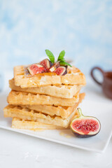 sweet breakfast Belgian waffles with honey and figs