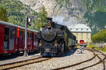 Gletsch station with steam locomotive