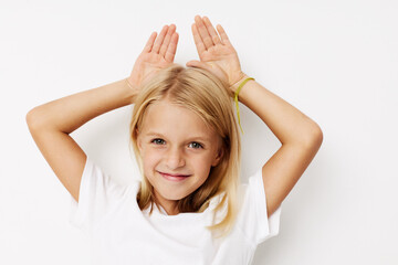 emotional girl in a white t-shirt grimace cropped view