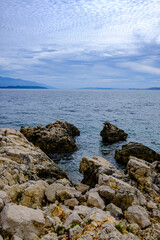 Fototapeta na wymiar seascape with clouds on the Adriatic Sea, early autumn, calm sea, late afternoon, Mediterranean